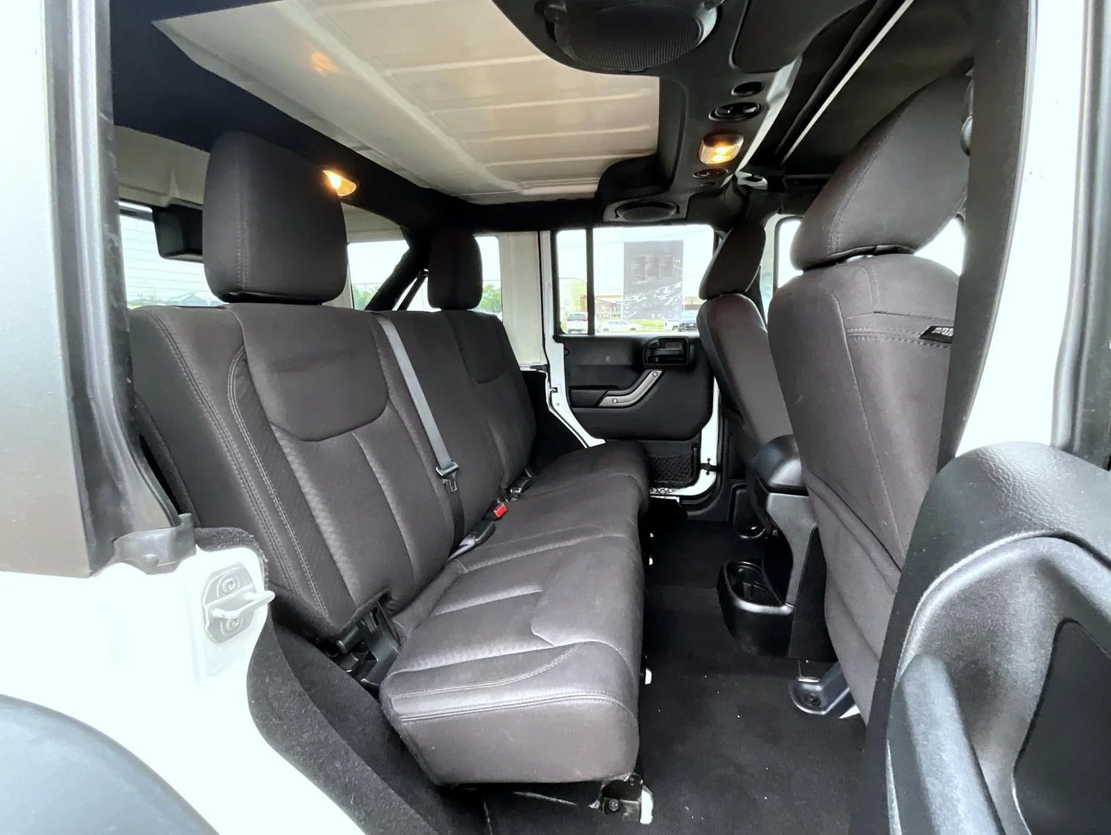Used 2013 White Jeep Unlimited Sport image 18