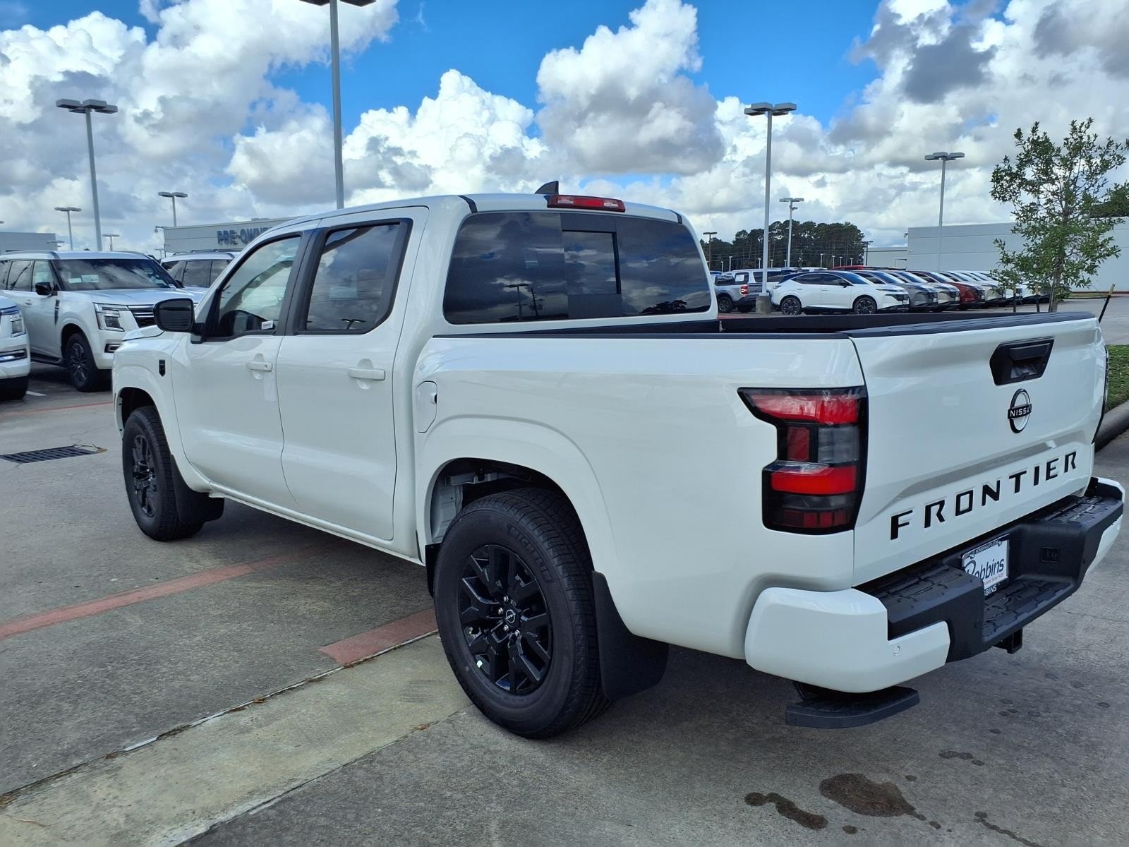 2026 Nissan Frontier Crew Cab SV White at Robbins Nissan