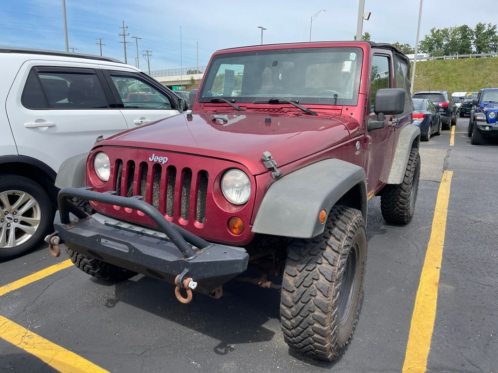 Used 2011 Jeep Wrangler Sport with VIN 1J4AA2D14BL526028 for sale in Barberton, OH