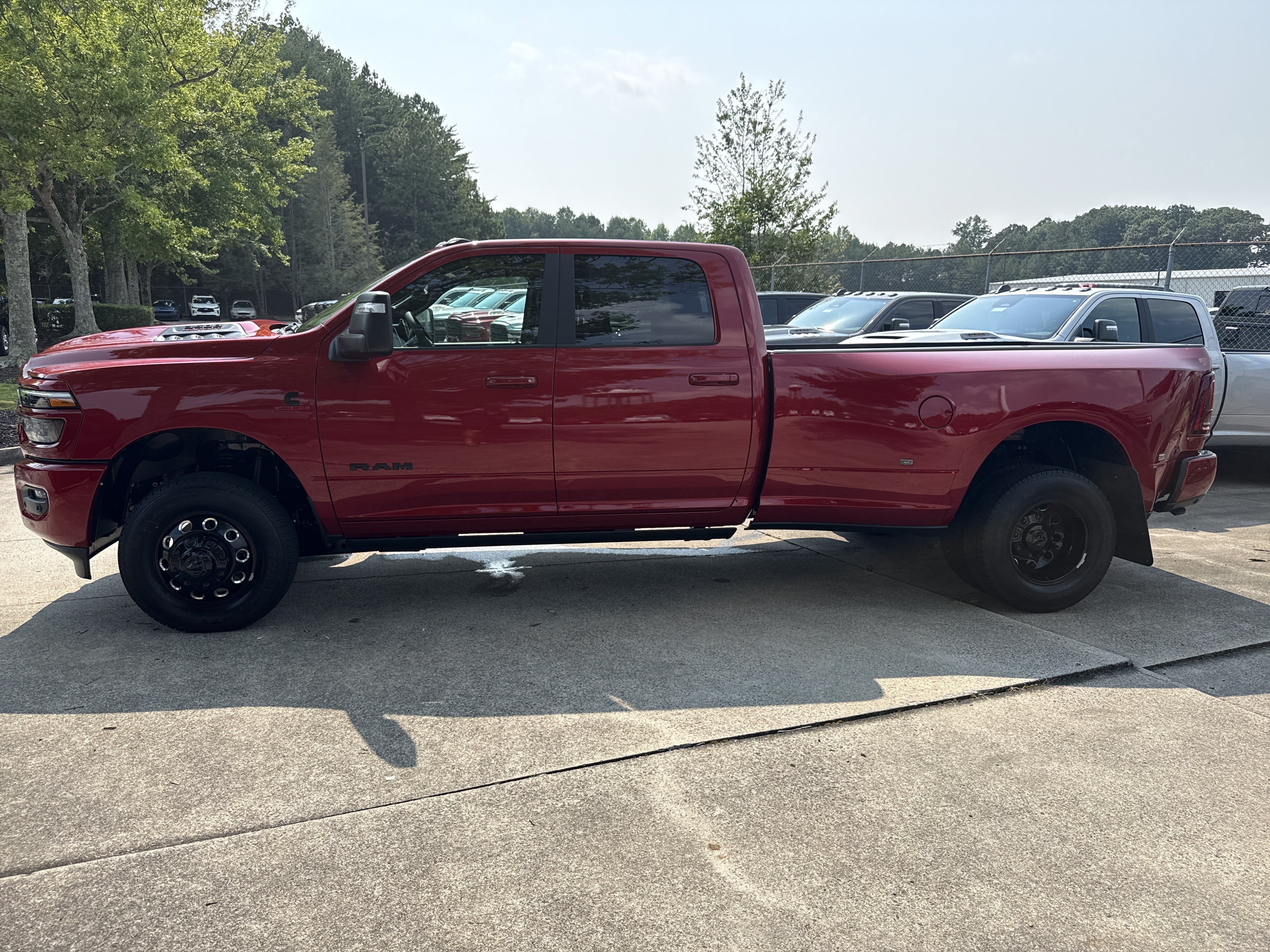 New 2026 Molten Red Pearlcoat RAM Laramie image 4