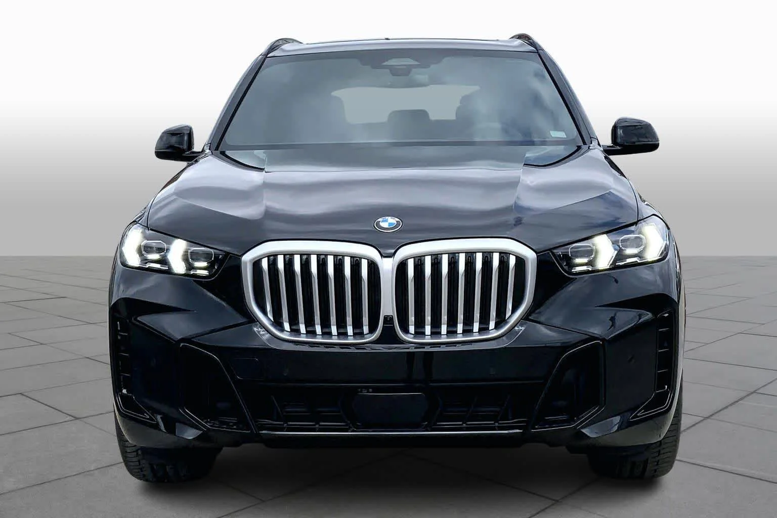 New 2026 Black Sapphire Metallic BMW sDrive40i image 3