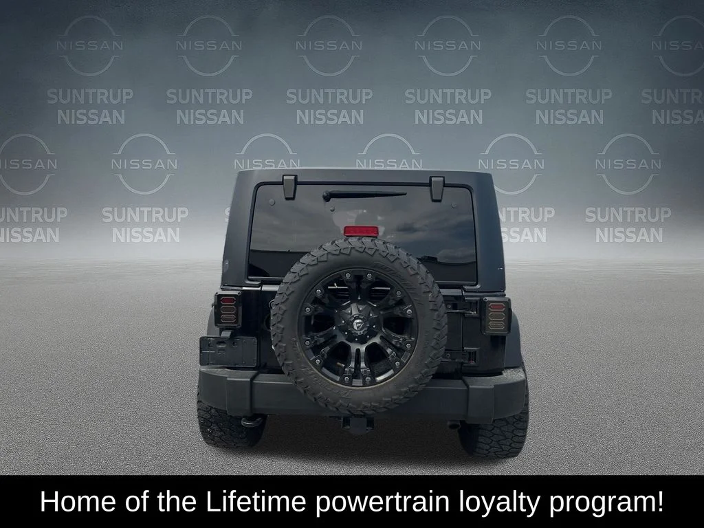 Used 2016 Black Jeep Unlimited Sport image 4