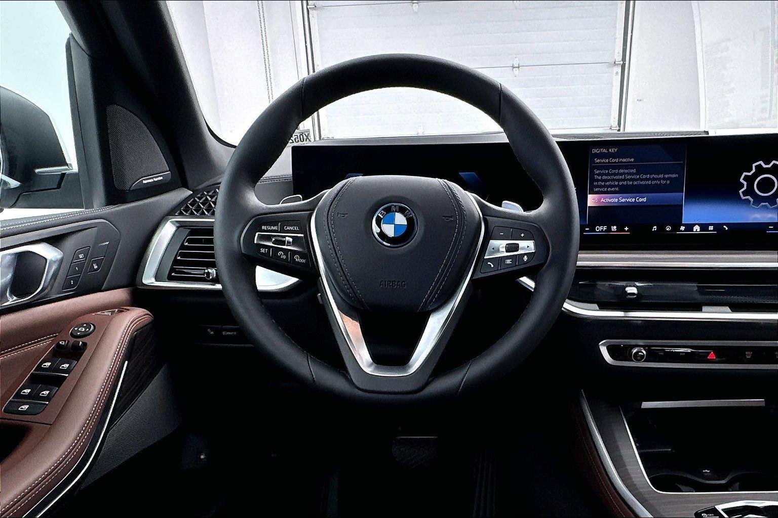 New 2026 Mineral White Metallic BMW xDrive50e image 11