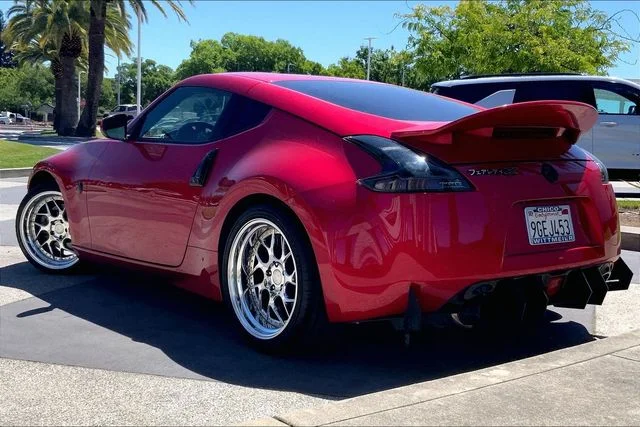 Used 2020 Passion Red Nissan Base image 12
