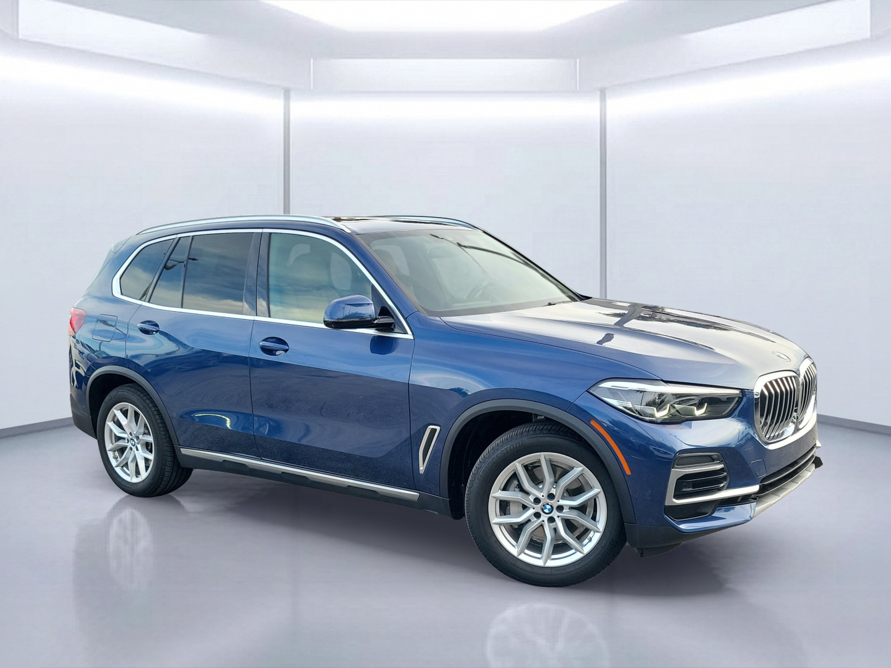 Used 2023 Phytonic Blue Metallic BMW xDrive40i image 1