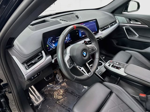 Used 2026 Black Sapphire Metallic BMW M35i image 9