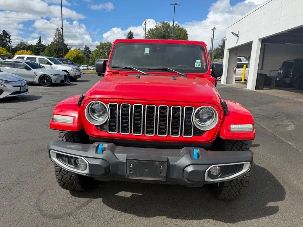 Used 2024 Red Jeep Sahara 4xe image 2