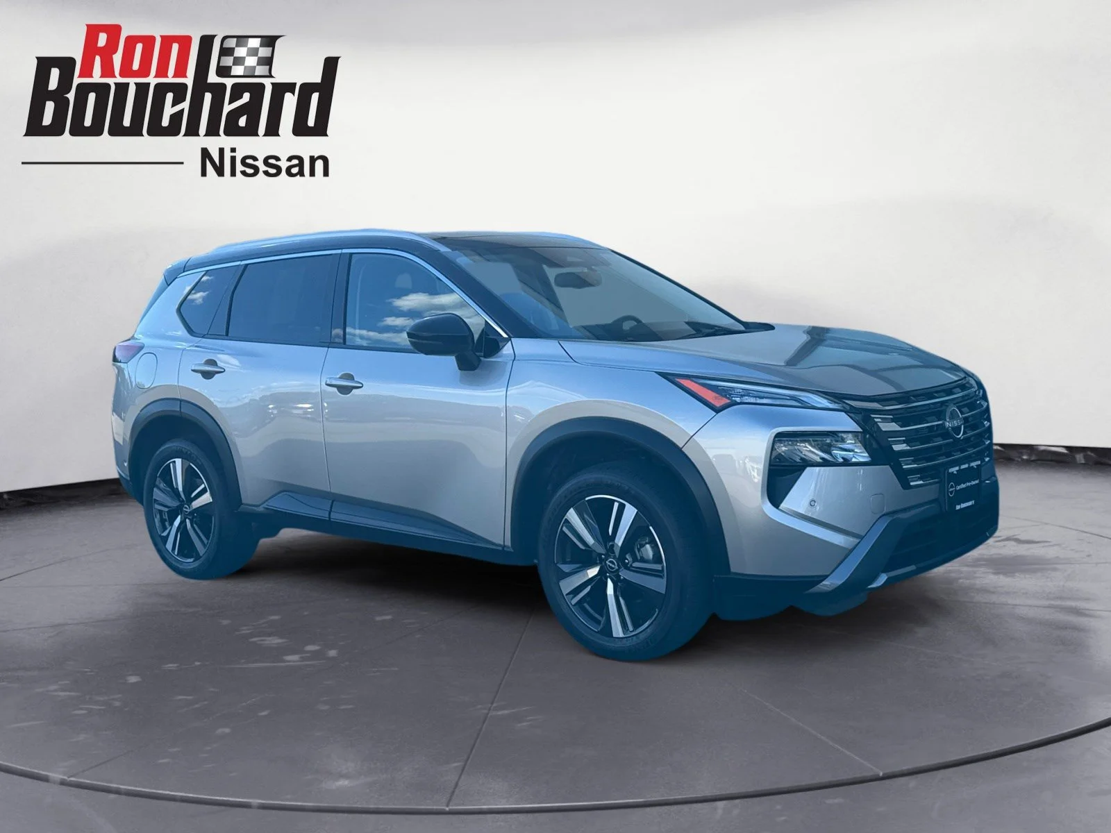 Used 2025 Champagne Silver Metallic/Super Black Nissan SL image 1