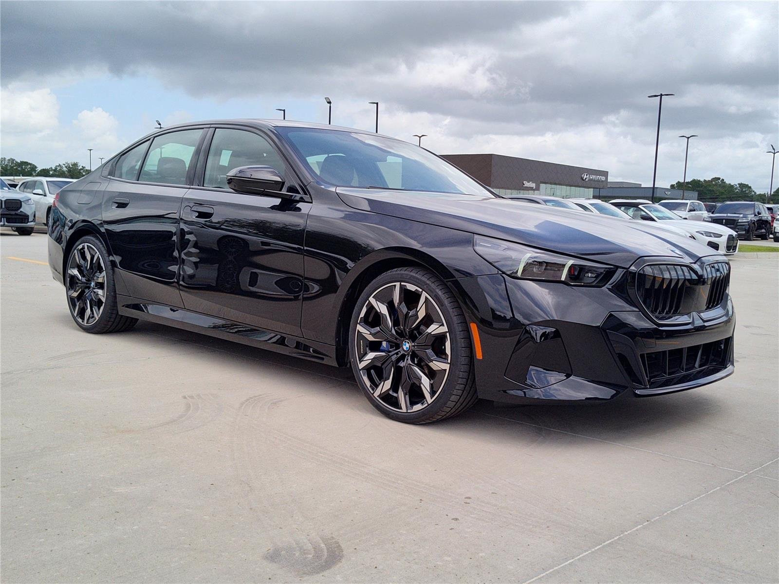 New 2027 Black Sapphire Metallic BMW 540i xDrive image 5