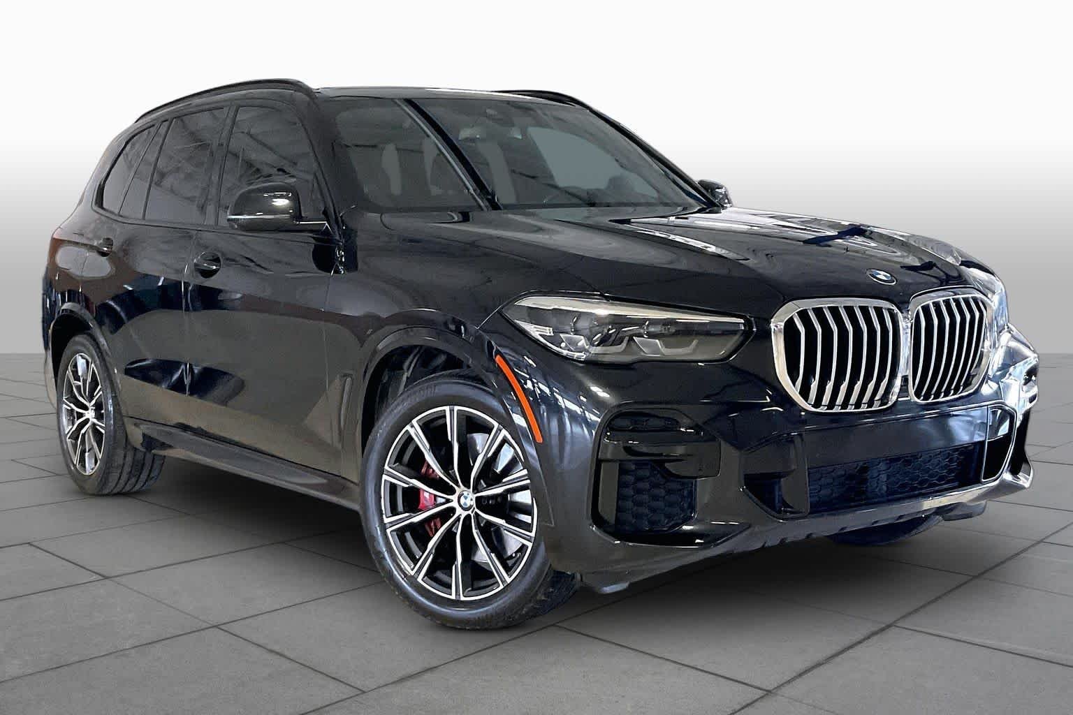 Used 2022 Black Sapphire Metallic BMW sDrive40i image 2