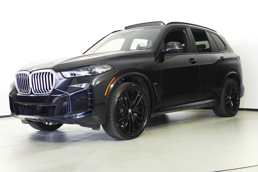 Certified Used 2024 Black Sapphire Metallic BMW sDrive40i image 2