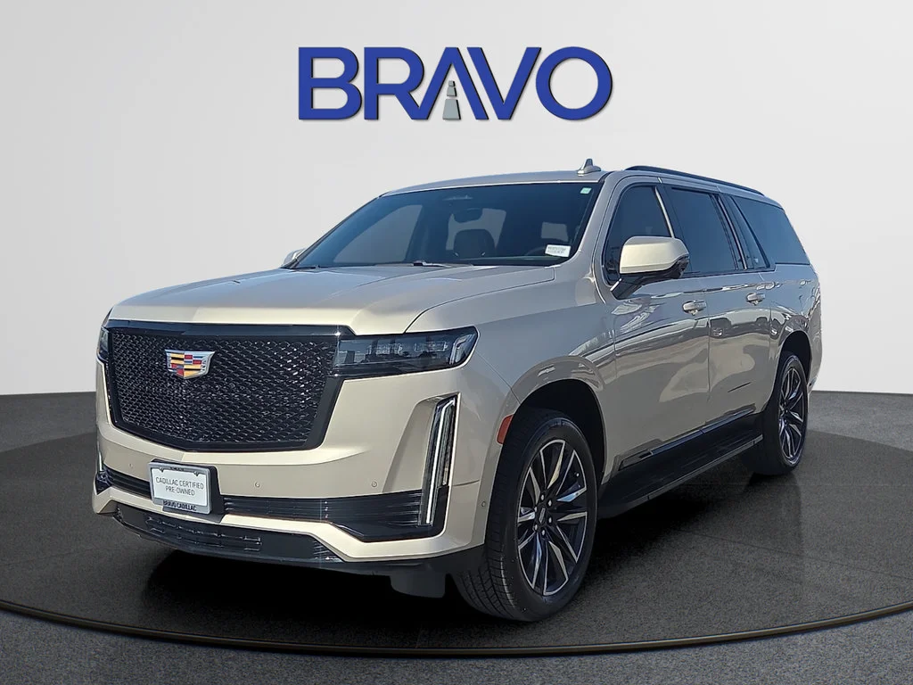Used 2024 Sandstone Metallic Cadillac Sport image 1