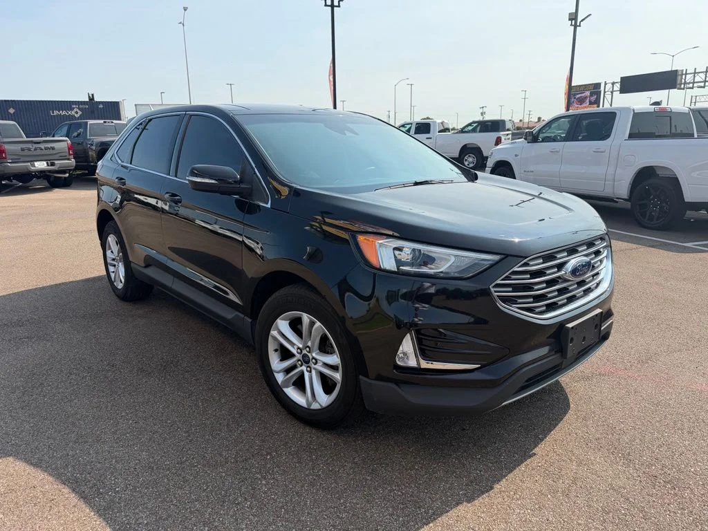 Used 2019 Agate Black Metallic Ford SEL image 7