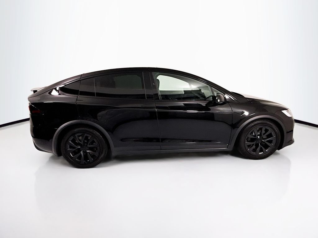 Used 2023 Solid Black Tesla  image 4
