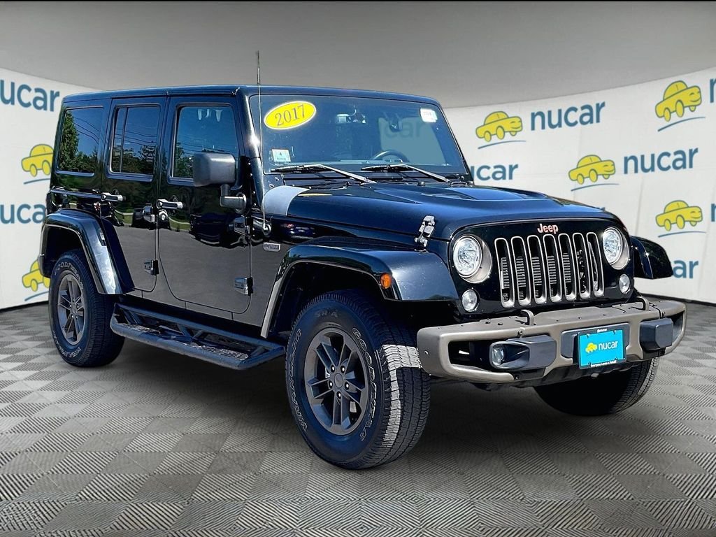 Used 2017 Black Jeep Unlimited Sahara image 1
