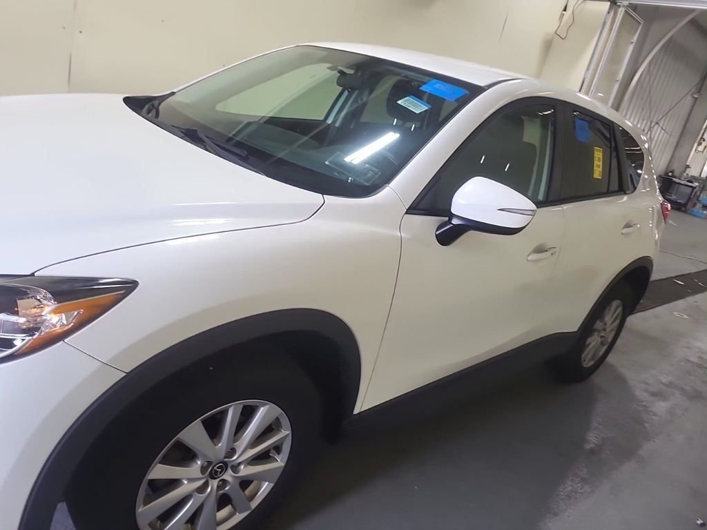 Used 2015 Mazda CX-5 Touring with VIN JM3KE4CY4F0548912 for sale in Marion, IA
