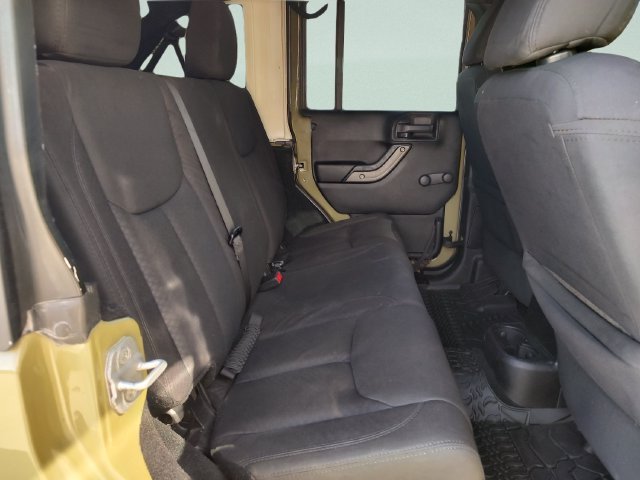 Used 2013 Green Jeep Unlimited Sport image 26