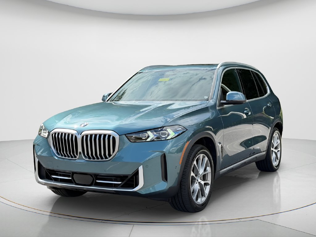 Certified Used 2024 Blue BMW xDrive40i image 1