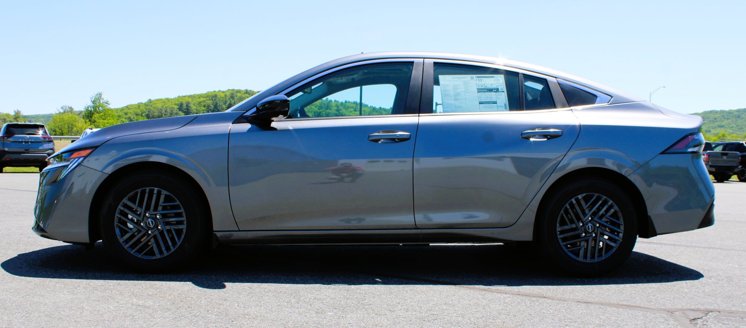 New 2026 Gun Metallic Nissan SV image 13