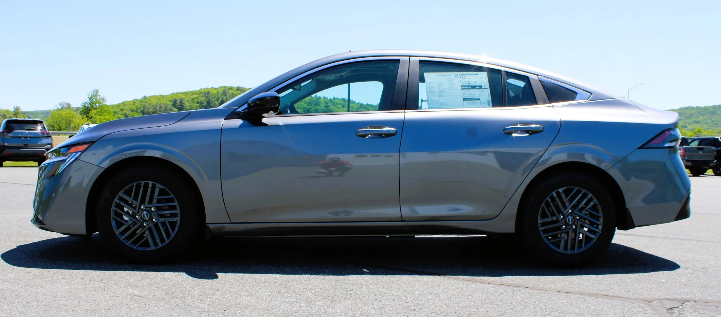 New 2026 Gun Metallic Nissan SV image 13