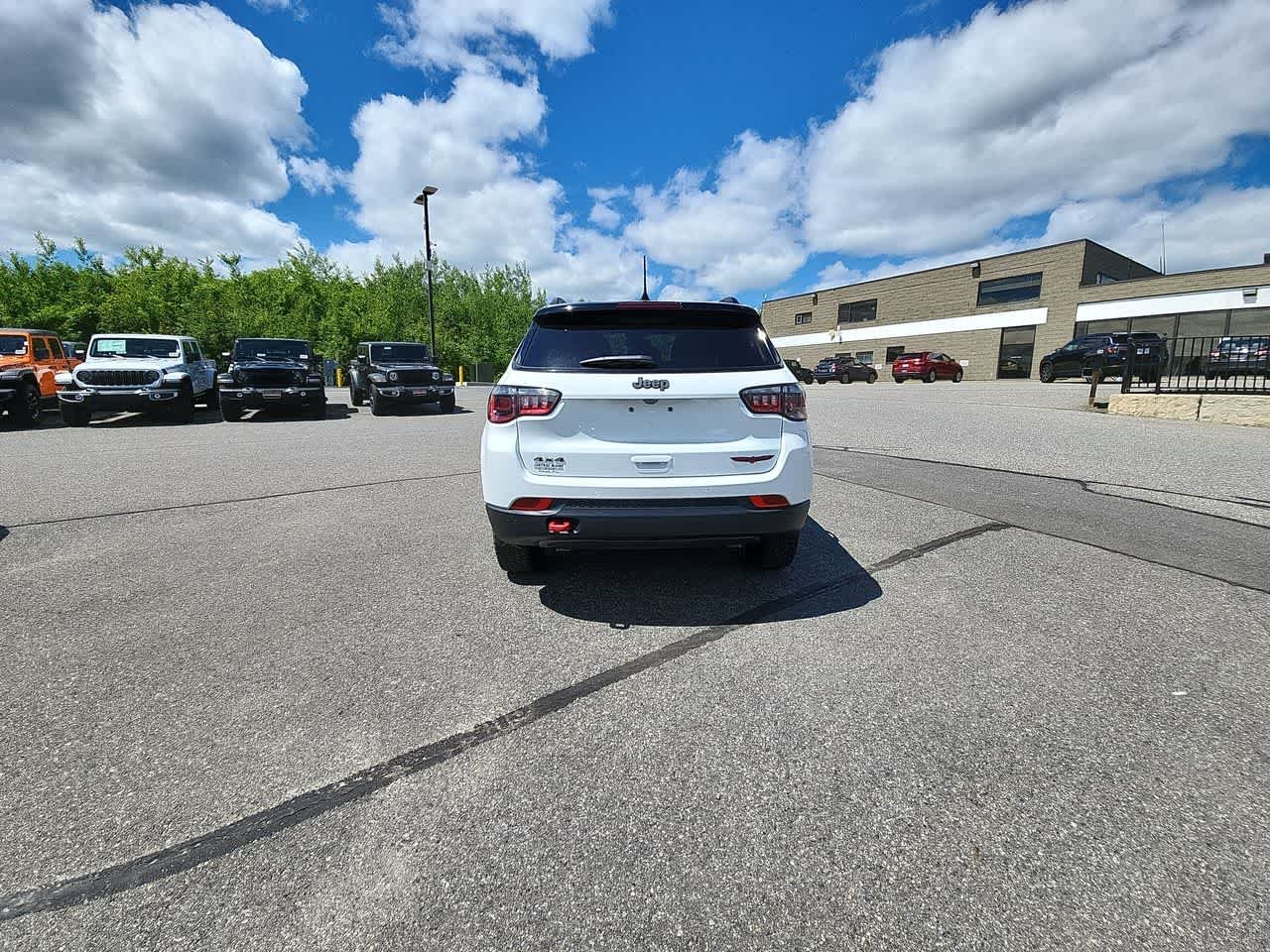Used 2025 Bright White Clearcoat Jeep Trailhawk image 8