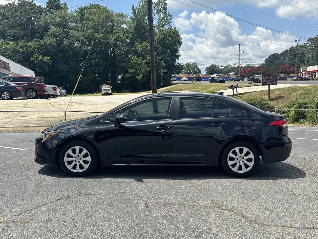Used 2024 Black Toyota LE image 4