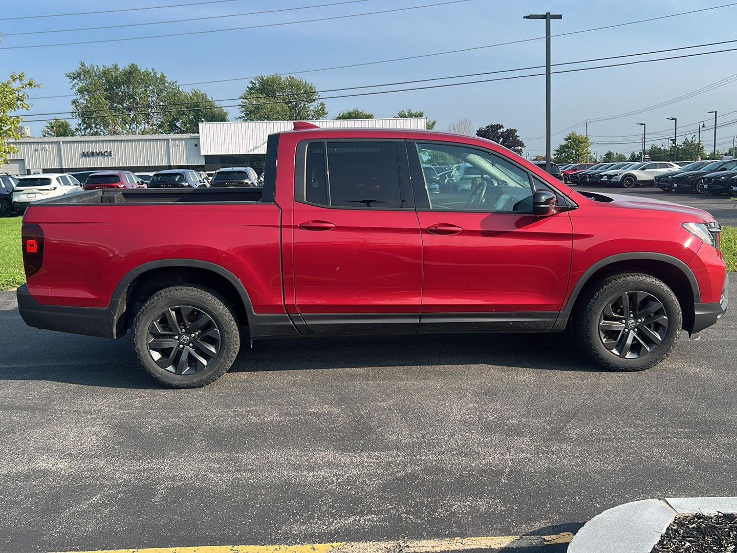 Used 2023 Radiant Red Metallic II Honda Sport image 4