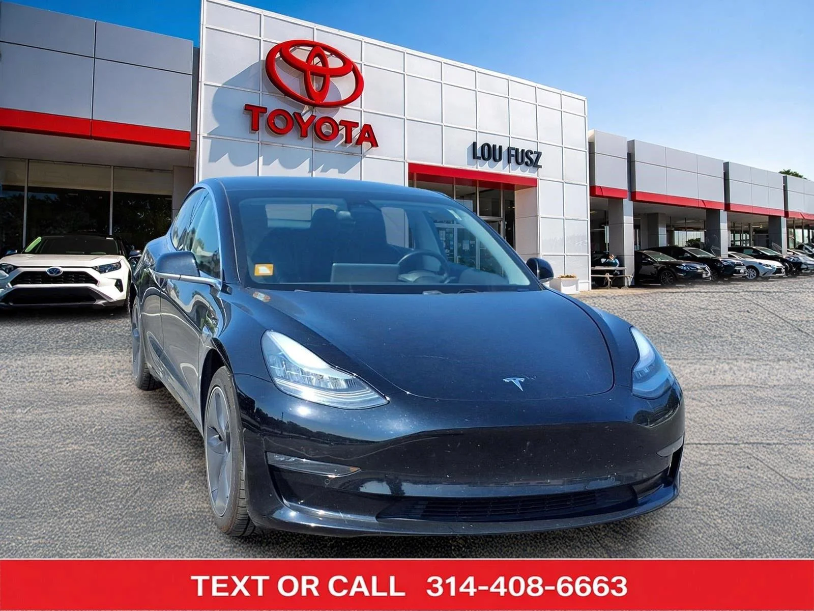 Used 2019 Solid Black Tesla Performance image 1
