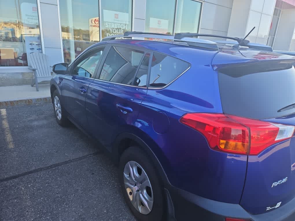 Used 2015 Blue Crush Metallic Toyota LE image 4