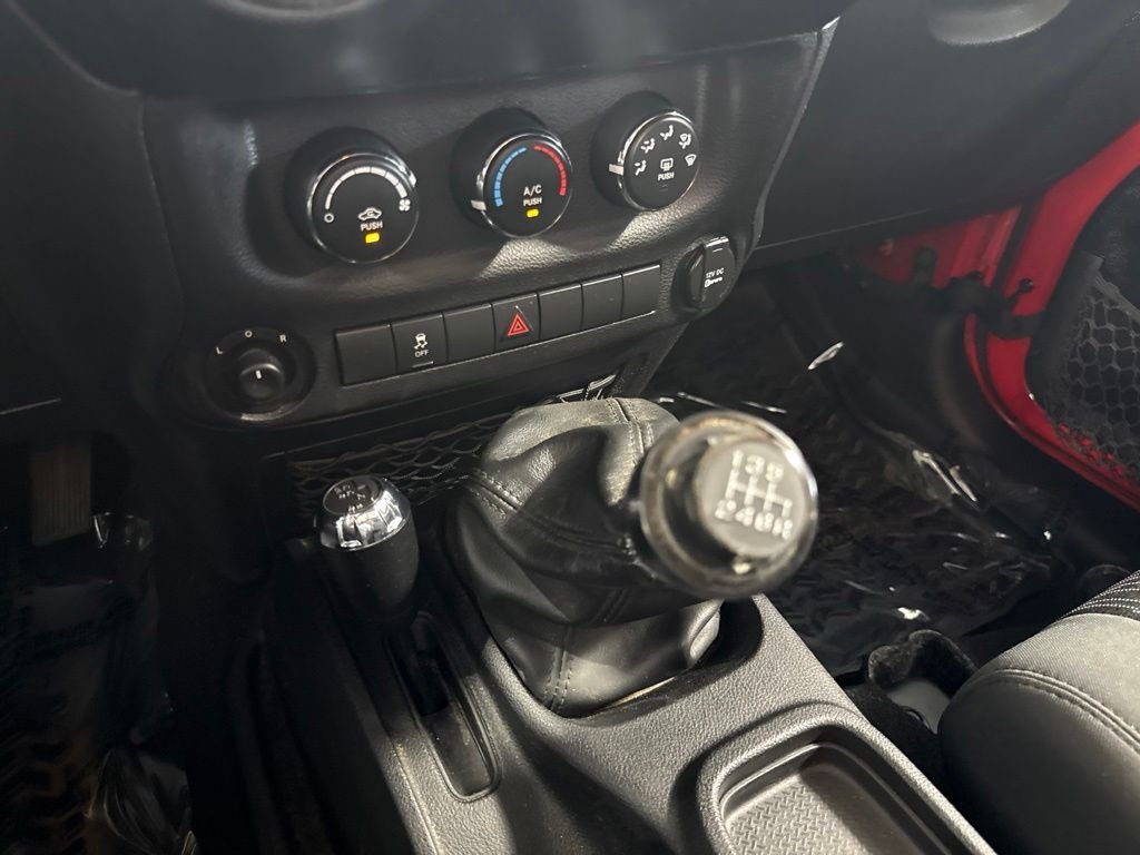 Used 2011 Red Jeep Unlimited Sport image 16