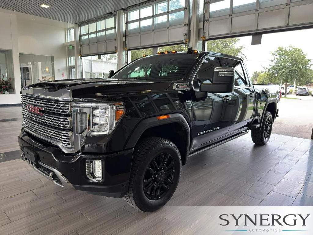 Used 2023 Ebony Twilight Metallic GMC Denali image 1