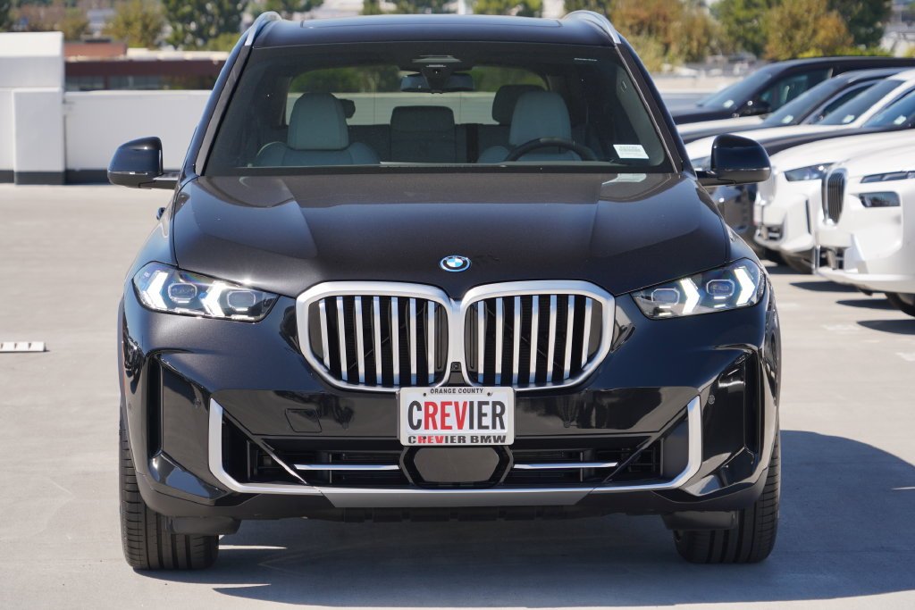 New 2026 Black Sapphire Metallic BMW xDrive50e image 2