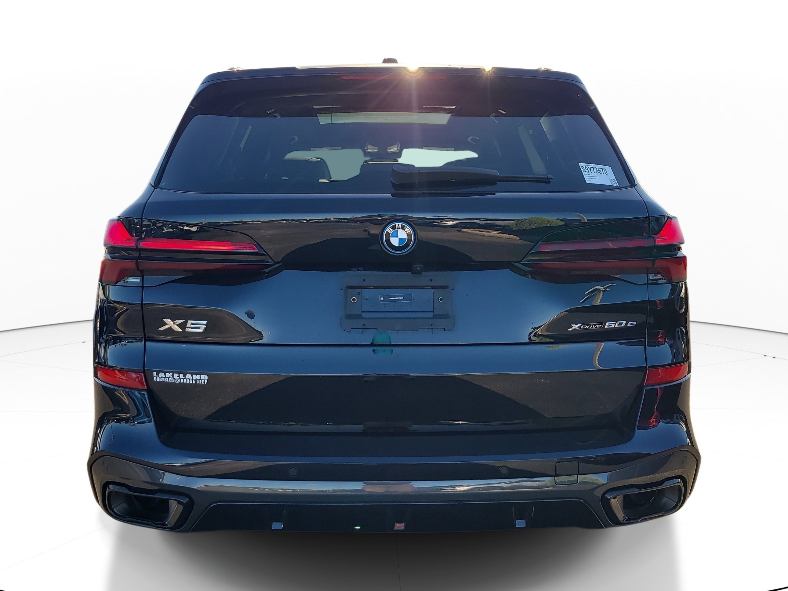 Used 2025 Carbon Black Metallic BMW xDrive50e image 5