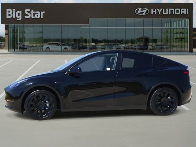 Used 2023 Tesla Model Y Long Range with VIN 7SAYGAEE3PF709769 for sale in Friendswood, TX
