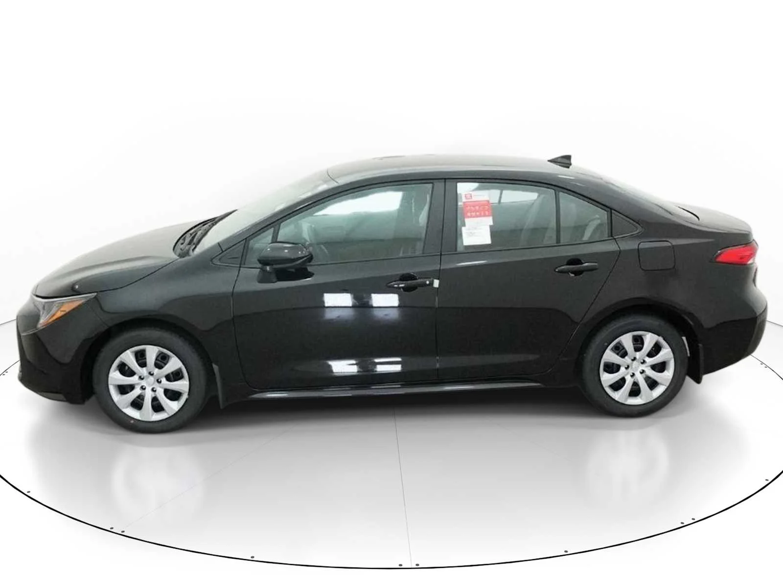 New 2026 Midnight Black Metallic Toyota LE image 3