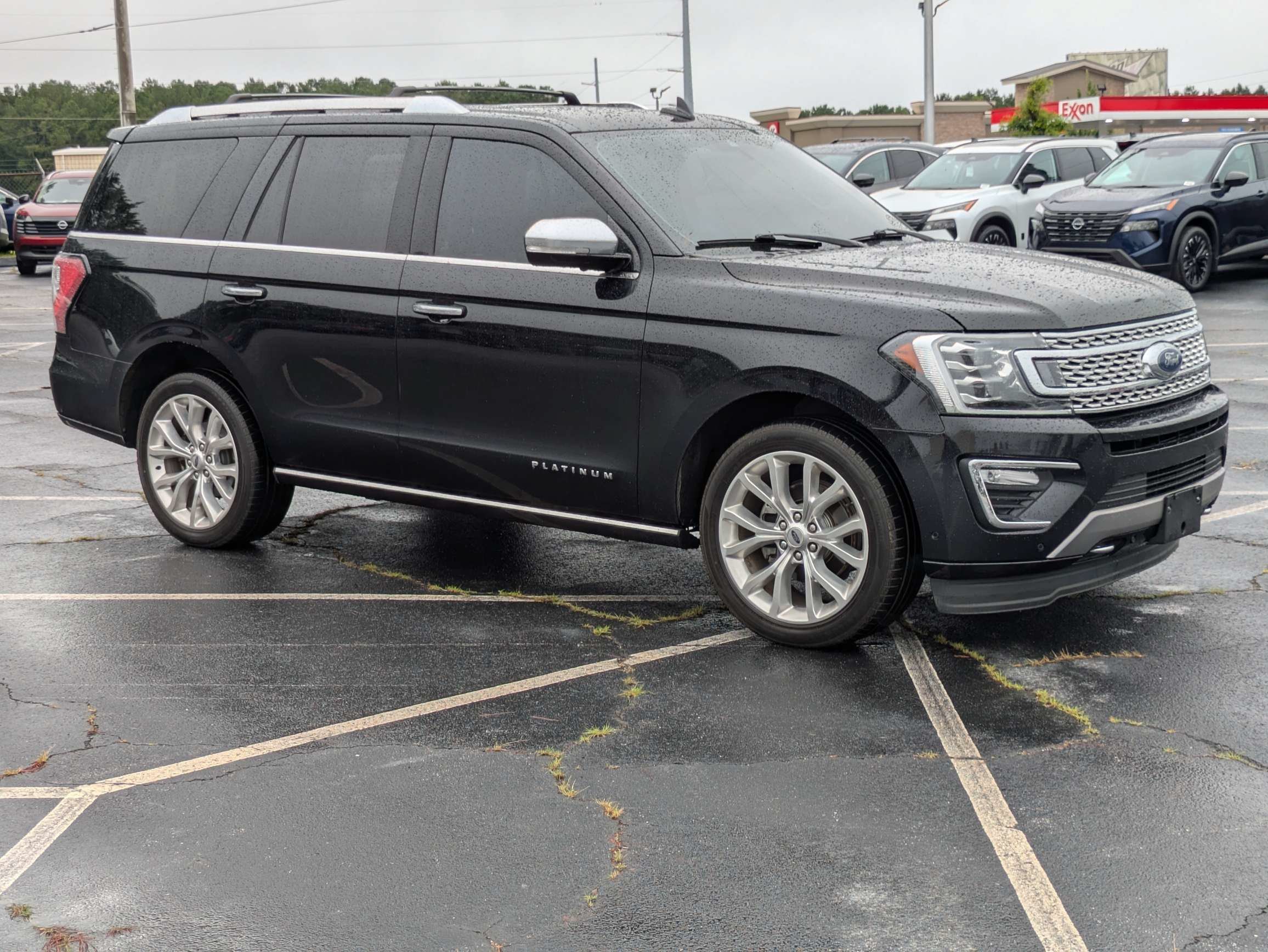 Used 2019 Black Ford Platinum image 1