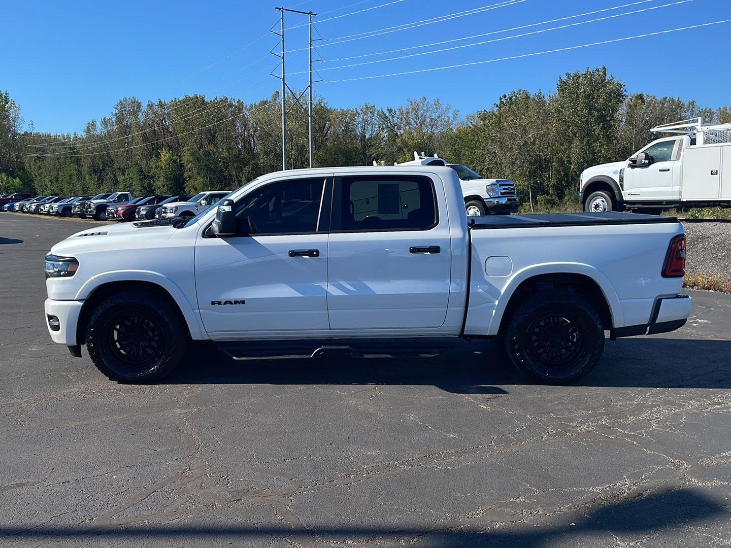 Used 2025 Ivory White Ram Laramie image 2