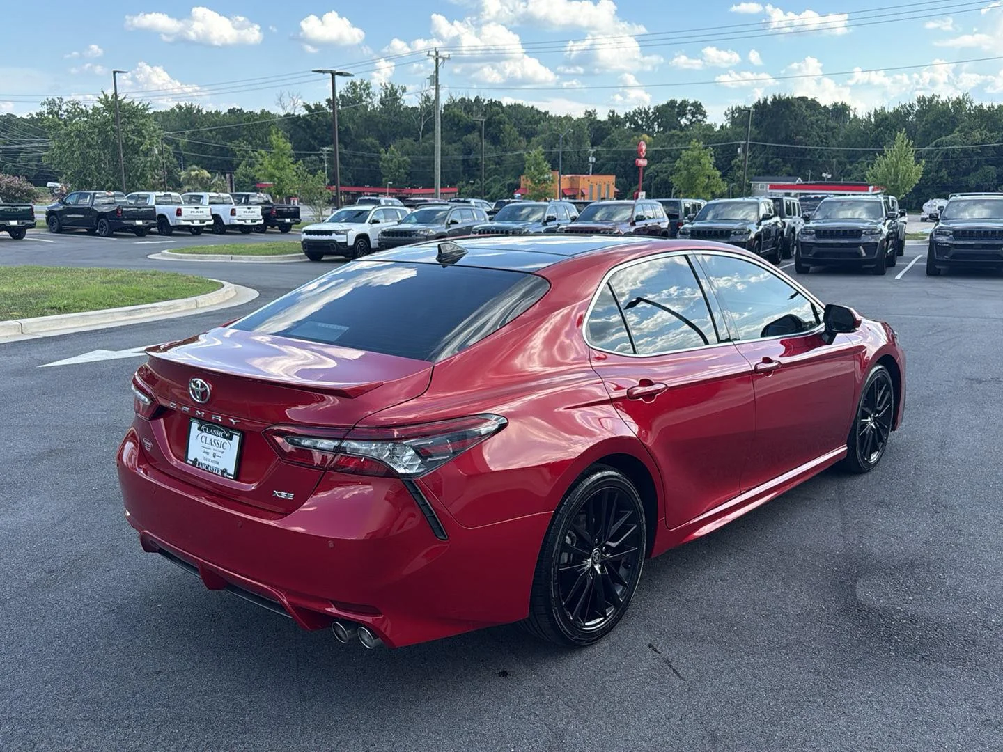 Used 2024 Supersonic Red Toyota XSE V6 image 6