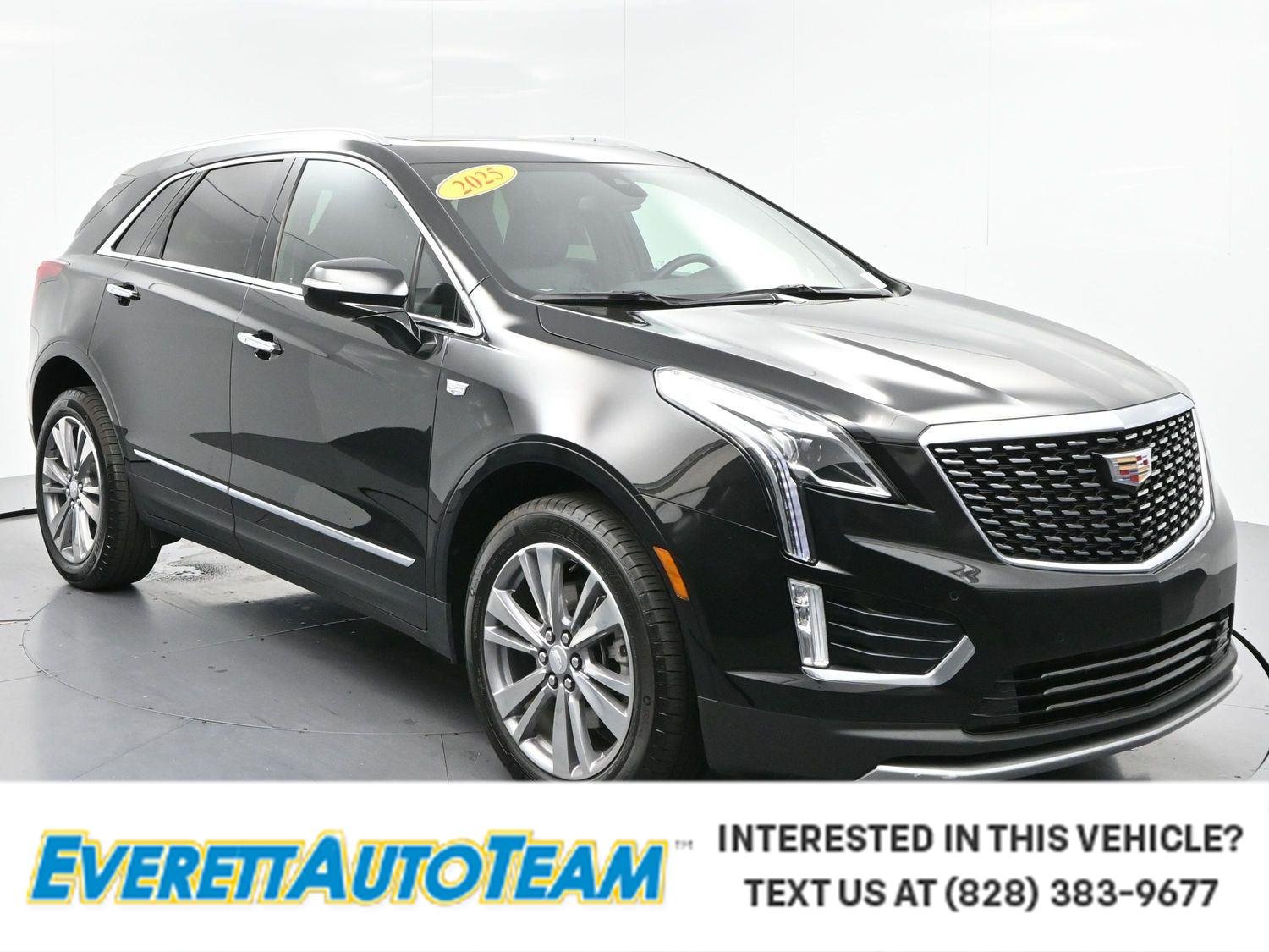 Used 2025 Stellar Black Metallic Cadillac AWD Premium Luxury image 1