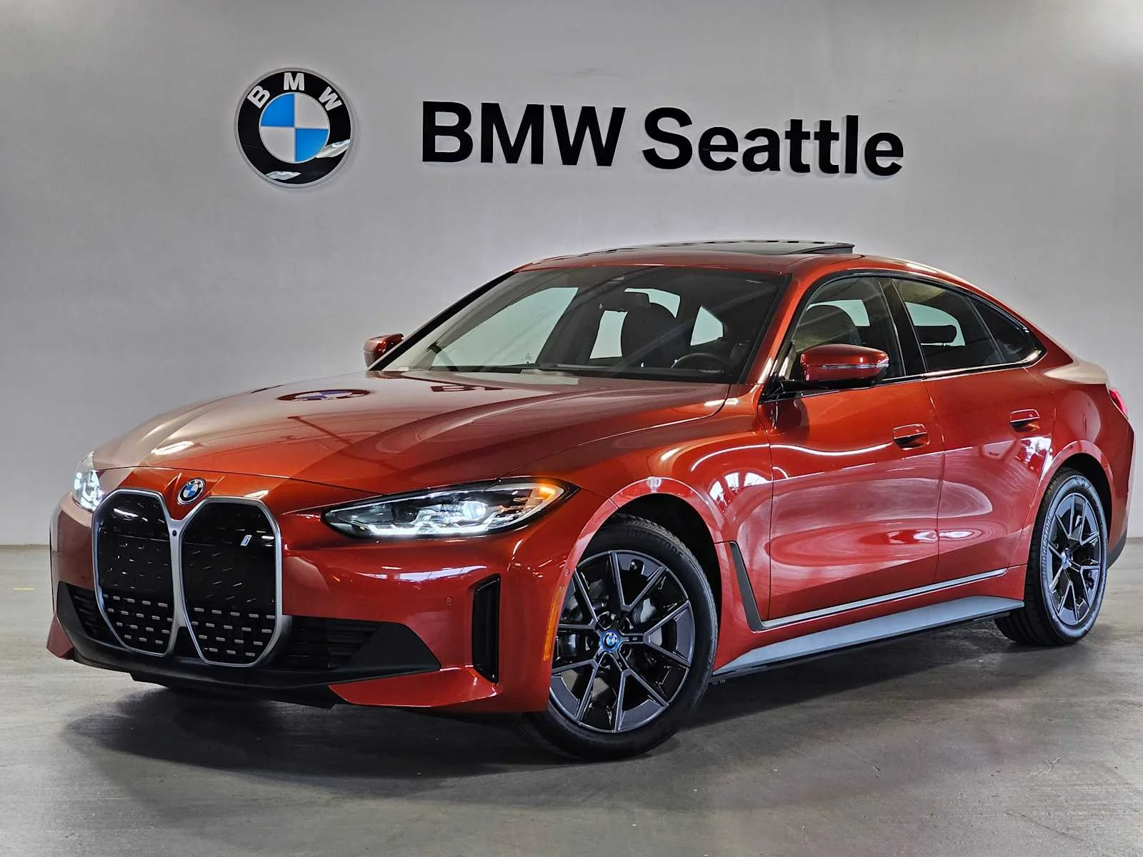 Certified Used 2023 Sunset Orange Metallic BMW eDrive35 image 1