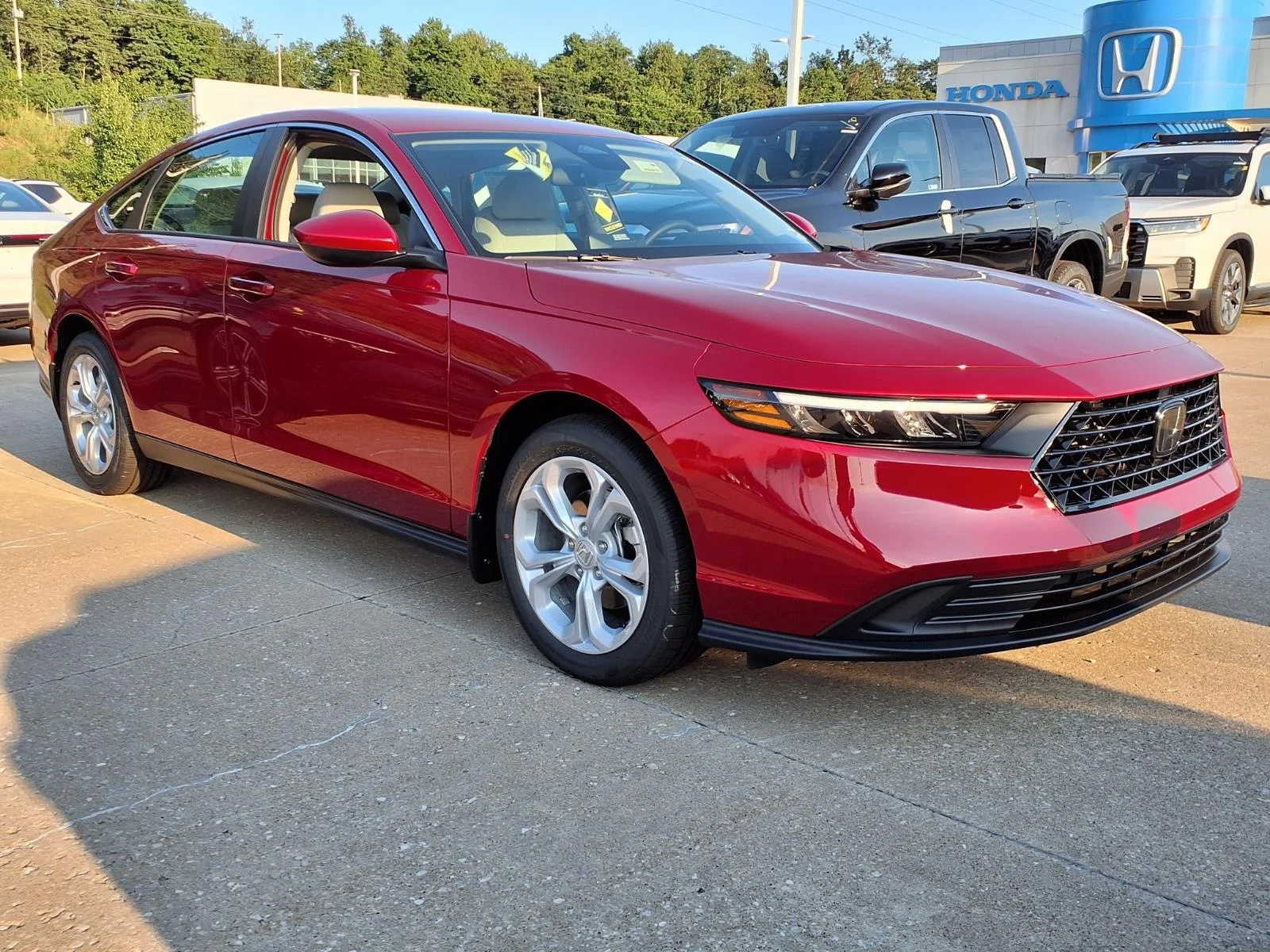 New 2026 Radiant Red Metallic Honda LX CVT image 1