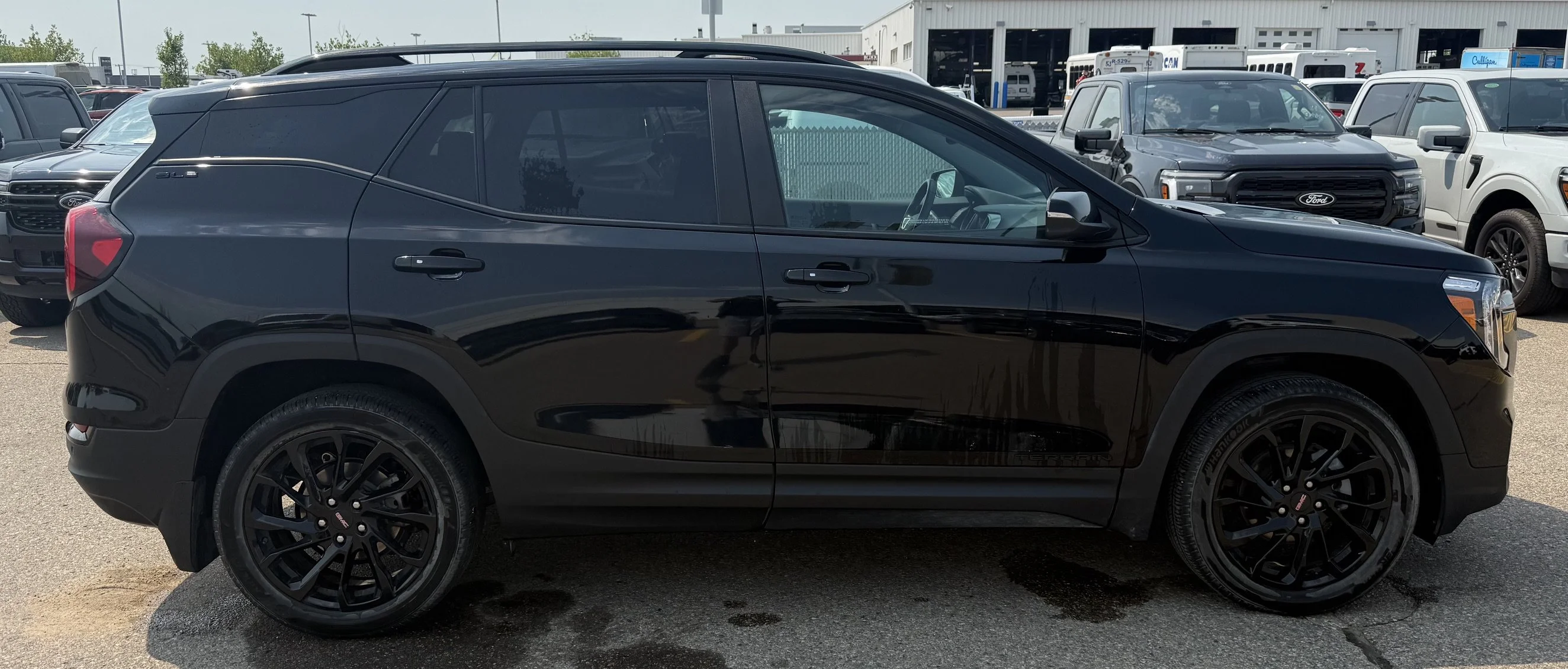 Used 2023 BLACK GMC SLE AWD **New Arrival** image 6