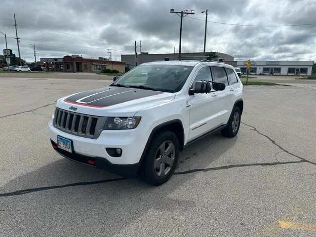 Used 2013 Bright White Jeep Laredo image 1