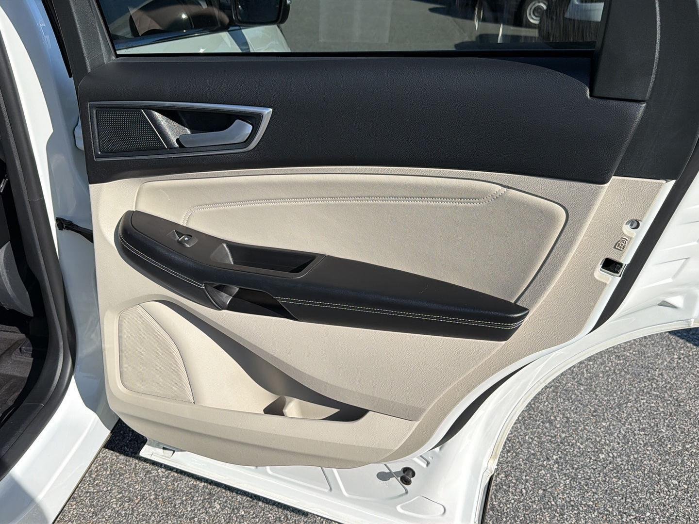 Used 2024 Star White Metallic Tri-Coat Ford Titanium image 16