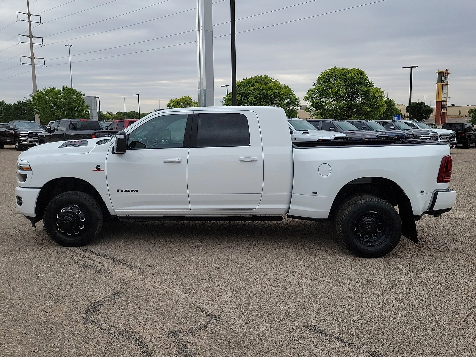 New 2026 PW7 Bright Whit Ram LARAMIE MEGA CAB 4X4 6