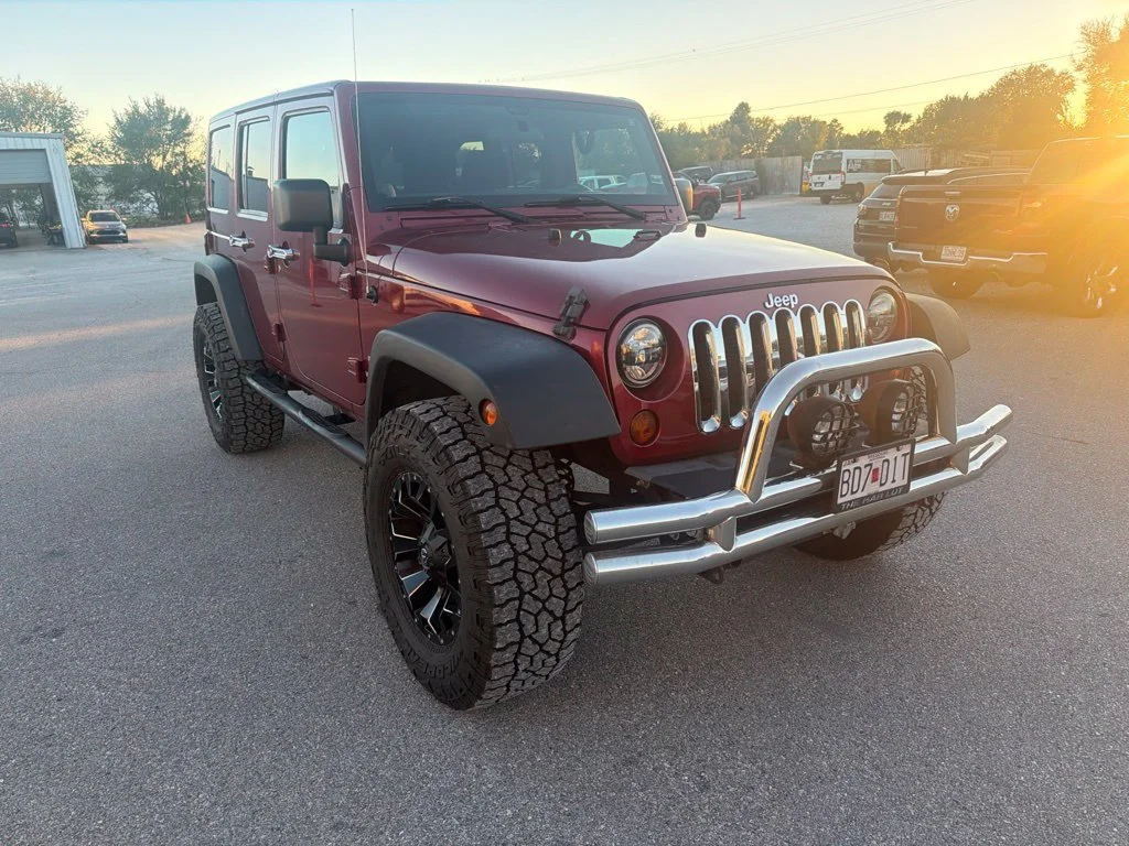 Used 2012 Red Jeep Unlimited Sport S image 4