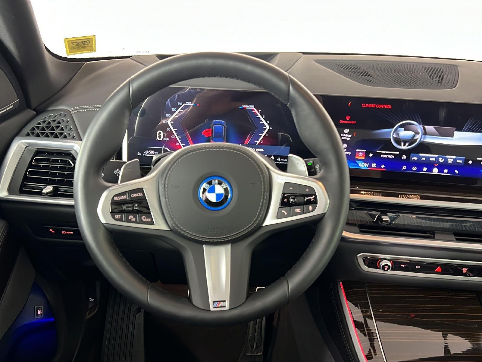 New 2026 Black Sapphire Metallic BMW xDrive50e image 12