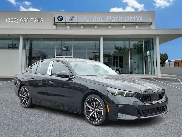 New 2027 Black Sapphire Metallic BMW 540i xDrive image 3