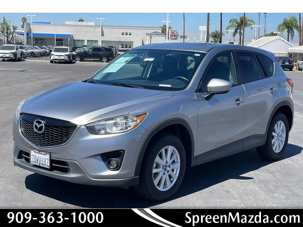Used 2014 Liquid Silver Metallic Mazda Touring image 1