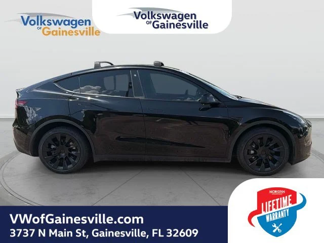 Used 2023 Tesla Model Y Long Range with VIN 7SAYGDEE9PA028093 for sale in Gainesville, FL